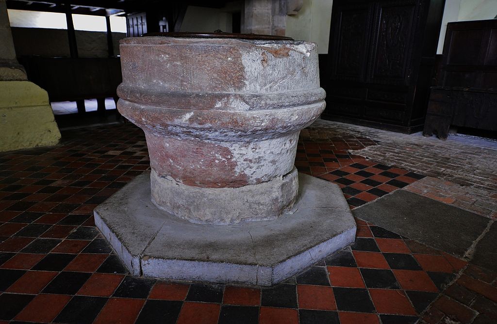 A Roman capital reused as a font at St Andrew's Church, Wroxeter